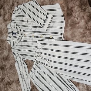 Two  piece pajama set with long sleeve button up shirt and long pants